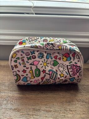 First Aid Beauty Pink Multi-Print Cosmetic Pouch